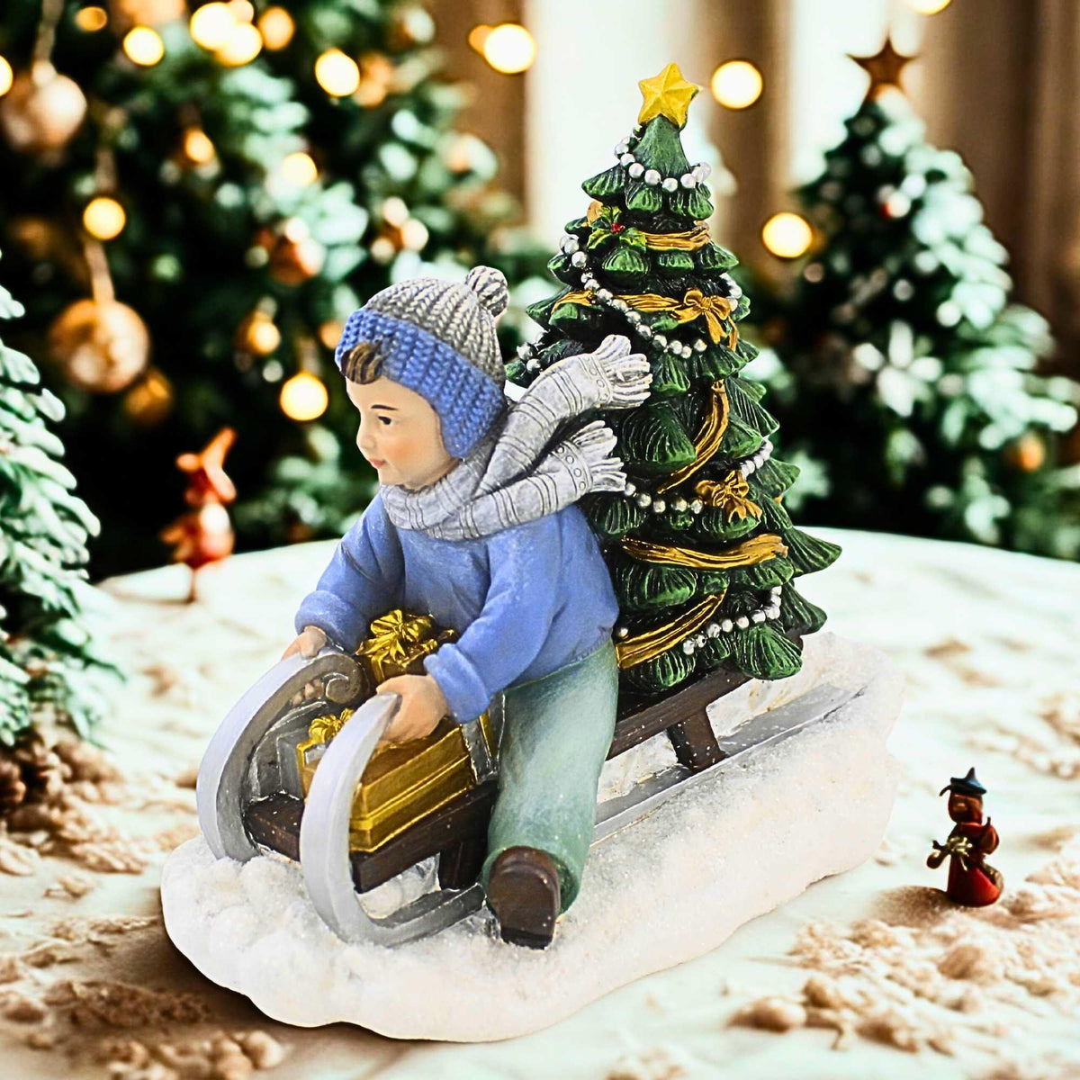 Joseph Studio Boy Sledding Figurine - - SBKGifts.com